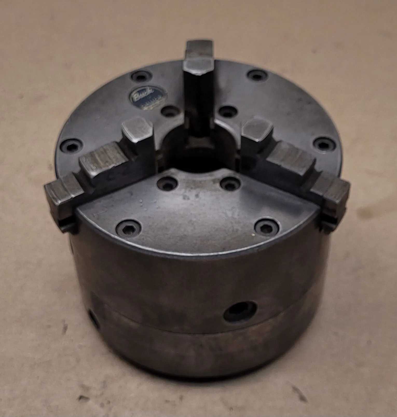BUCK 1434 - 4IN 3 JAW CHUCK (DIAMETER: 4", JAWS: 3, CENTER HOLE: 1") - MACHINING TOOLING & PARTS